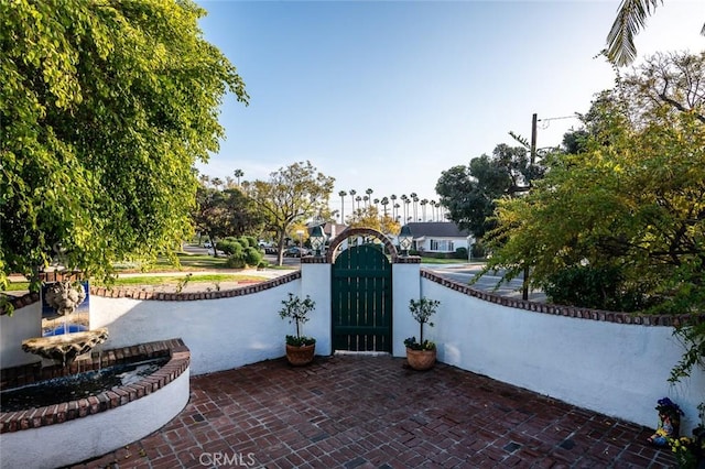 1731 W Kenneth Rd, Glendale, CA 91201 - view of patio with a gate