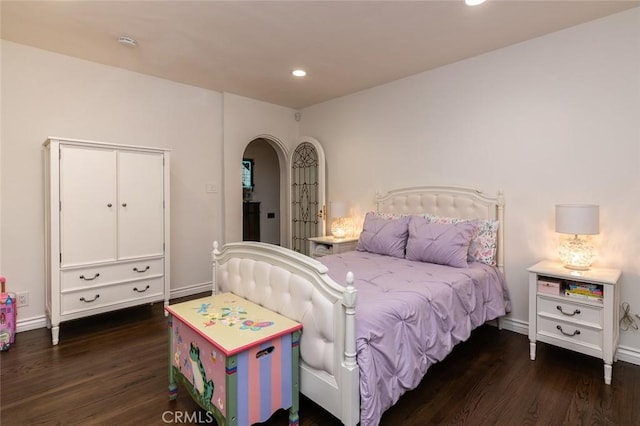 1731 W Kenneth Rd, Glendale, CA 91201 - bedroom with dark wood-style flooring, recessed lighting, arched walkways, and baseboards
