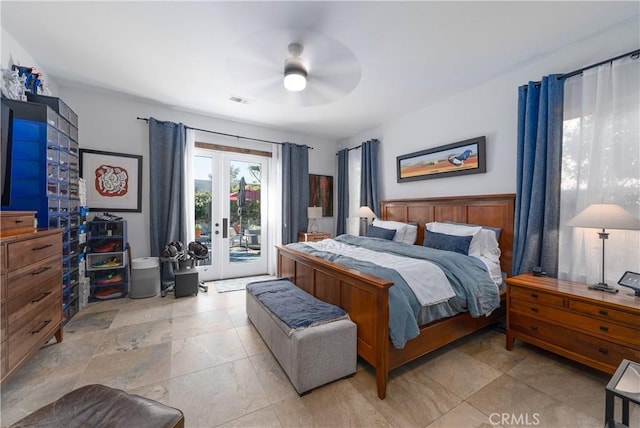 9 Via Dulcinea, Dulcinea, Palm Desert, CA 92260 - bedroom featuring access to outside, stone finish floors, ceiling fan, and french doors