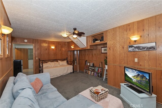 1027 Nesthorn Dr, Crestline, CA 92325 - bedroom featuring wooden walls and carpet