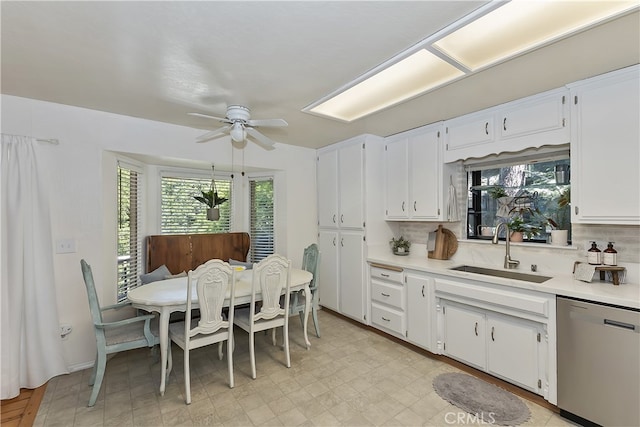 1027 Nesthorn Dr, Crestline, CA 92325 - kitchen featuring dishwasher, a sink, light countertops, and healthy amount of natural light