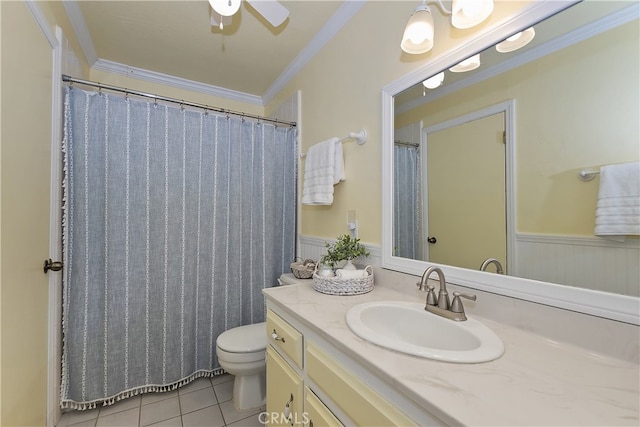 1027 Nesthorn Dr, Crestline, CA 92325 - bathroom featuring tile patterned flooring, a wainscoted wall, crown molding, toilet, and a ceiling fan