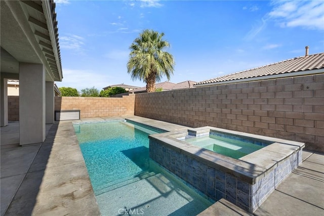 view of swimming pool featuring a fenced backyard and an in-ground hot tub