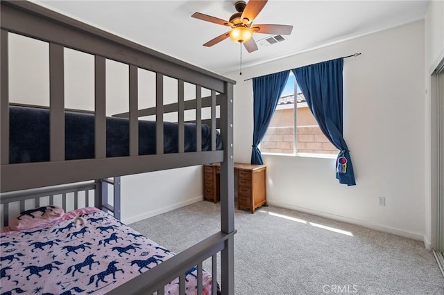 bedroom featuring carpet flooring, baseboards, and ceiling fan