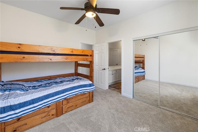 bedroom featuring carpet floors, a ceiling fan, baseboards, and a closet