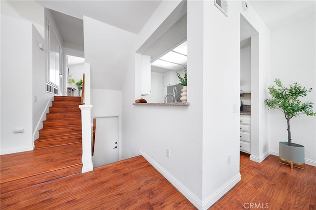 1188 Walnut Grove Ave Unit A, Rosemead, CA 91770 - staircase with wood finished floors and baseboards