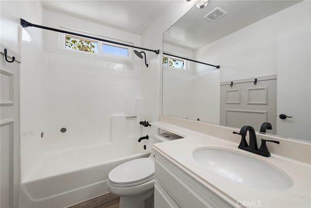 26932 Begonia Pl, Mission Viejo, CA 92692 - full bath featuring toilet, vanity, shower / bathtub combination, and wood finished floors