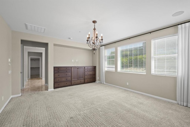1797 Santa Christina Ave, Chula Vista, CA 91913 - unfurnished bedroom with baseboards, carpet, and a chandelier