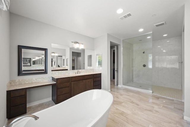 1797 Santa Christina Ave, Chula Vista, CA 91913 - full bathroom featuring a freestanding tub, a stall shower, vanity, and recessed lighting