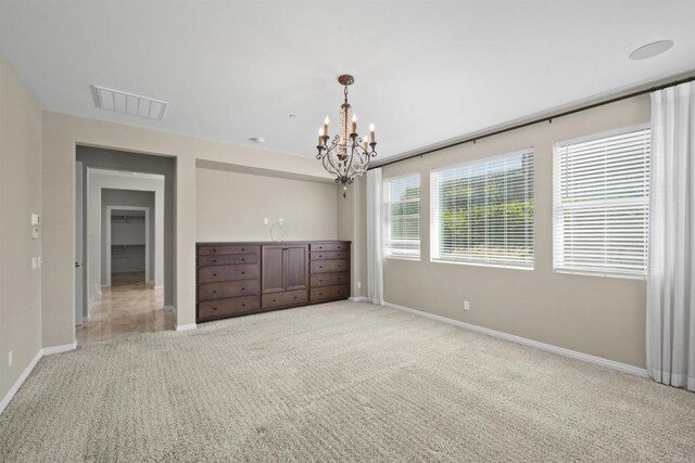 1797 Santa Christina Ave, Chula Vista, CA 91913 - unfurnished bedroom featuring carpet and a chandelier