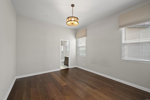 1797 Santa Christina Ave, Chula Vista, CA 91913 - empty room with baseboards and dark wood-style flooring
