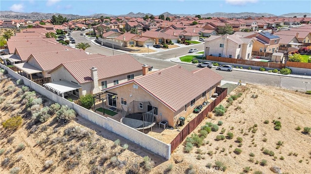 aerial perspective of suburban area featuring a mountainous background