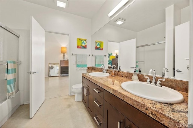 253 N Bush St, Santa Ana, CA 92701 - bathroom with double vanity, concrete floors, and an enclosed shower