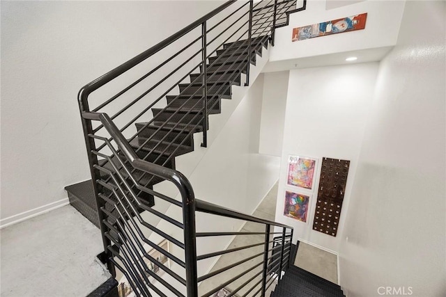 253 N Bush St, Santa Ana, CA 92701 - stairs with concrete flooring and a towering ceiling