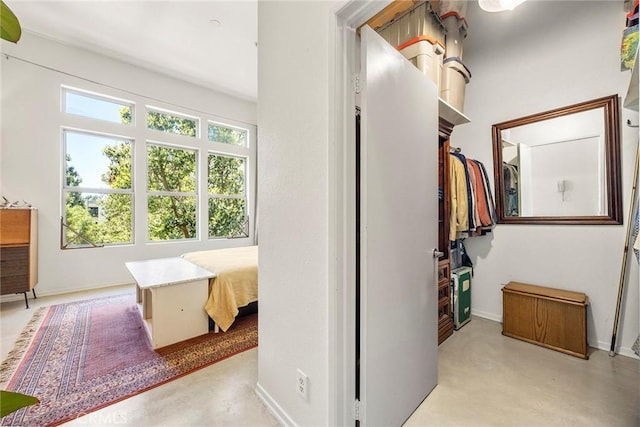 253 N Bush St, Santa Ana, CA 92701 - hall with finished concrete flooring and baseboards