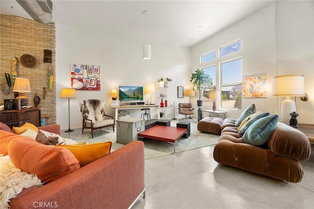 253 N Bush St, Santa Ana, CA 92701 - living room with finished concrete floors and a towering ceiling
