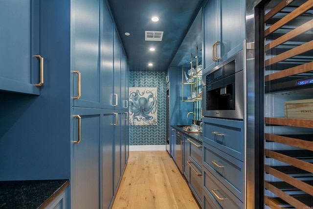 417 Warwick Ave, Cardiff By The Sea, CA 92007 - indoor wet bar featuring light wood finished floors, recessed lighting, and beverage cooler