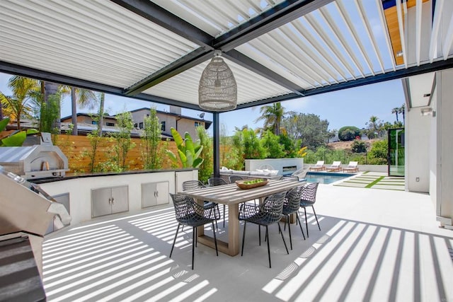 417 Warwick Ave, Cardiff By The Sea, CA 92007 - view of patio with an outdoor kitchen, an outdoor pool, fence, and outdoor dining area
