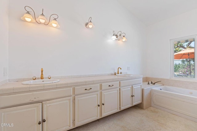 bathroom with a sink and a bath