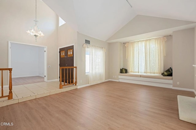 4078 Bending Oak Ct, Moorpark, CA 93021 - unfurnished living room featuring a chandelier, high vaulted ceiling, and wood finished floors