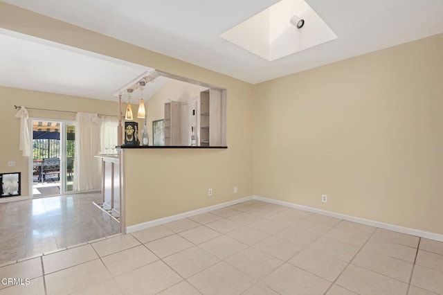4078 Bending Oak Ct, Moorpark, CA 93021 - unfurnished living room featuring light tile patterned floors and a skylight