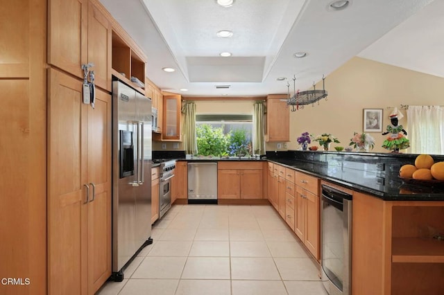 4078 Bending Oak Ct, Moorpark, CA 93021 - kitchen with premium appliances, a peninsula, open shelves, light tile patterned flooring, and dark stone counters