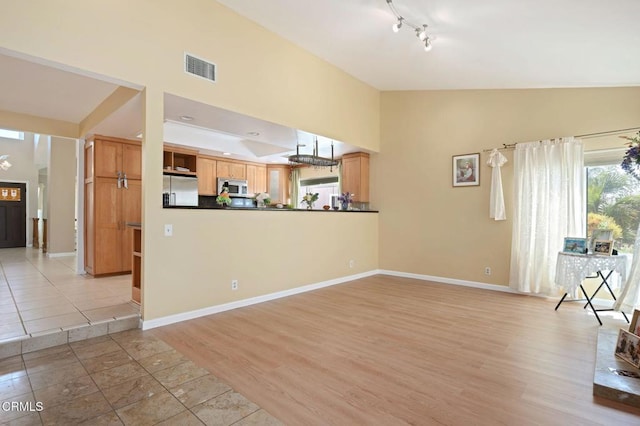 4078 Bending Oak Ct, Moorpark, CA 93021 - unfurnished living room with high vaulted ceiling and light wood-style flooring