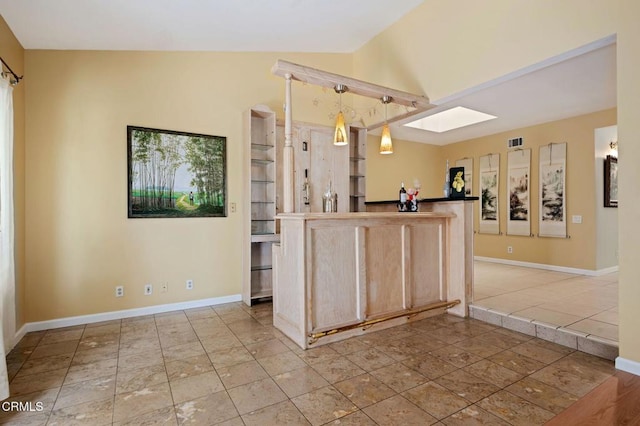 4078 Bending Oak Ct, Moorpark, CA 93021 - kitchen featuring a skylight, lofted ceiling, and hanging light fixtures