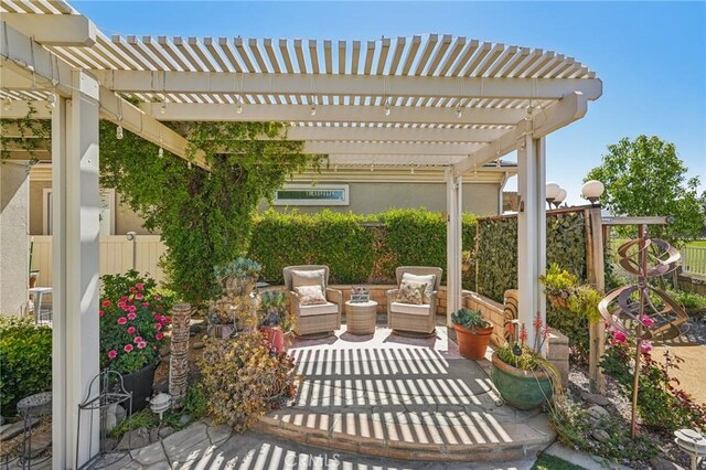 19575 Vermillion Ln, Apple Valley, CA 92308 - view of patio with fence, a pergola, and an outdoor living space