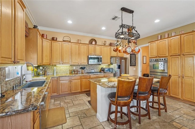 19575 Vermillion Ln, Apple Valley, CA 92308 - kitchen with stainless steel appliances, stone tile floors, ornamental molding, a center island, and decorative backsplash