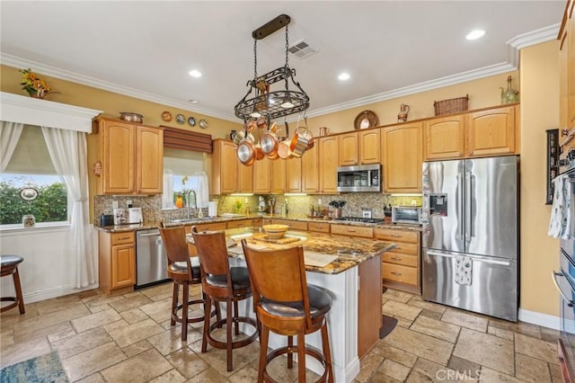 19575 Vermillion Ln, Apple Valley, CA 92308 - kitchen featuring stainless steel appliances, stone tile flooring, a sink, decorative backsplash, and crown molding