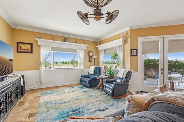 19575 Vermillion Ln, Apple Valley, CA 92308 - living room featuring crown molding, a wainscoted wall, stone finish flooring, french doors, and ceiling fan