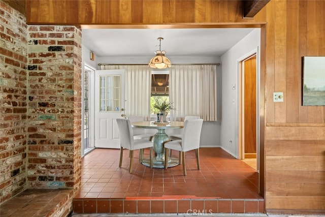 10508 Fimple Rd, Chico, CA 95928 - tiled dining area featuring healthy amount of natural light and wooden walls