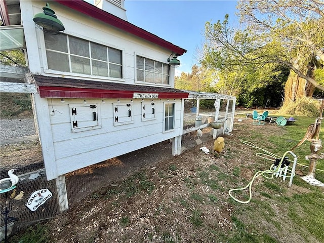 9869 Kehl Canyon Rd, Cherry Valley, CA 92223 - view of side of home with exterior structure