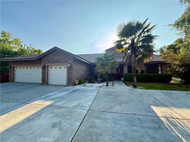 9869 Kehl Canyon Rd, Cherry Valley, CA 92223 - view of front of property featuring concrete driveway and a garage
