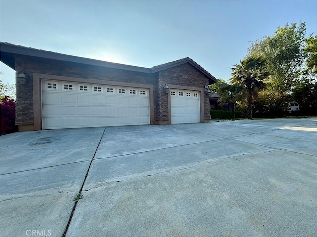 9869 Kehl Canyon Rd, Cherry Valley, CA 92223 - garage with concrete driveway