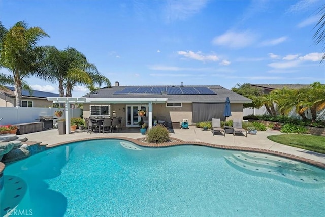 1266 Marina Rd, Corona, CA 92880 - view of swimming pool featuring french doors, a patio area, area for grilling, fence, and outdoor dining area