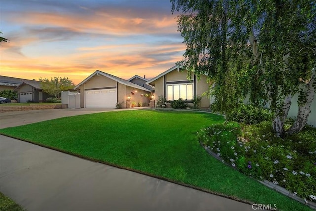 1266 Marina Rd, Corona, CA 92880 - view of front of home featuring stucco siding, a garage, a lawn, and driveway