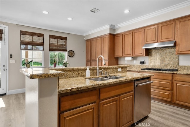 14215 Rolling Stream Pl, Eastvale, CA 92880 - kitchen featuring a sink, under cabinet range hood, brown cabinetry, ornamental molding, and light wood-type flooring