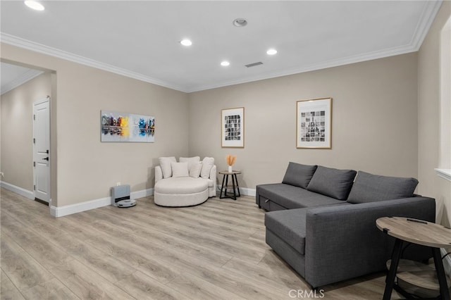 14215 Rolling Stream Pl, Eastvale, CA 92880 - living area featuring light wood-style flooring, crown molding, recessed lighting, and baseboards