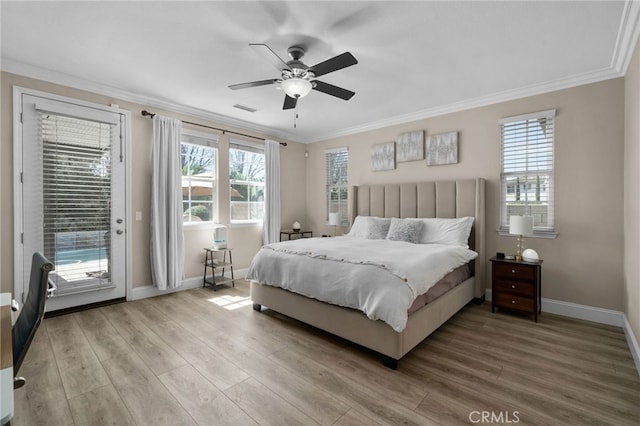 14215 Rolling Stream Pl, Eastvale, CA 92880 - bedroom with crown molding, access to outside, baseboards, wood finished floors, and multiple windows