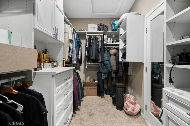 14215 Rolling Stream Pl, Eastvale, CA 92880 - spacious closet with light colored carpet and attic access