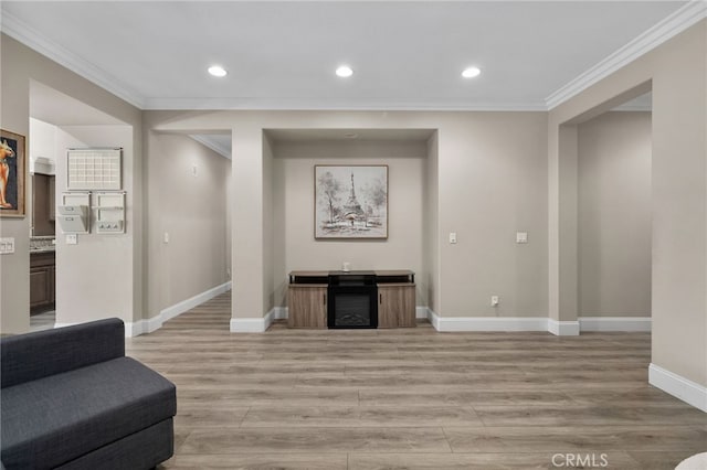 14215 Rolling Stream Pl, Eastvale, CA 92880 - living room featuring crown molding, baseboards, light wood-type flooring, a fireplace, and recessed lighting