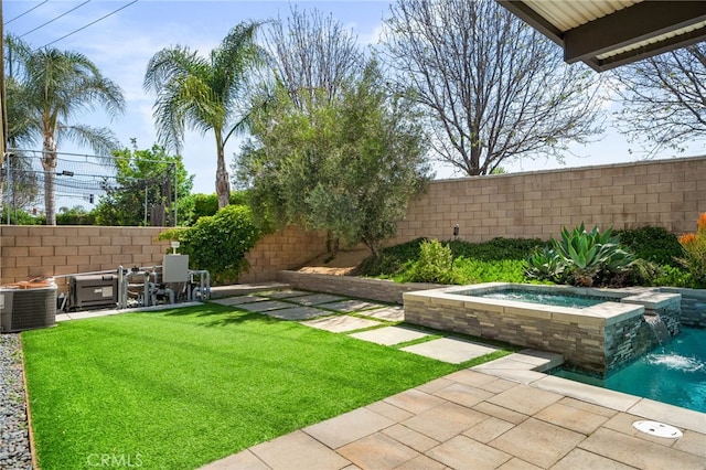 14215 Rolling Stream Pl, Eastvale, CA 92880 - view of yard with a patio area, central AC unit, and a pool with connected hot tub
