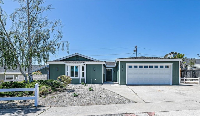 654 Carina Dr, Lompoc, CA 93436 - ranch-style house featuring fence, an attached garage, and driveway