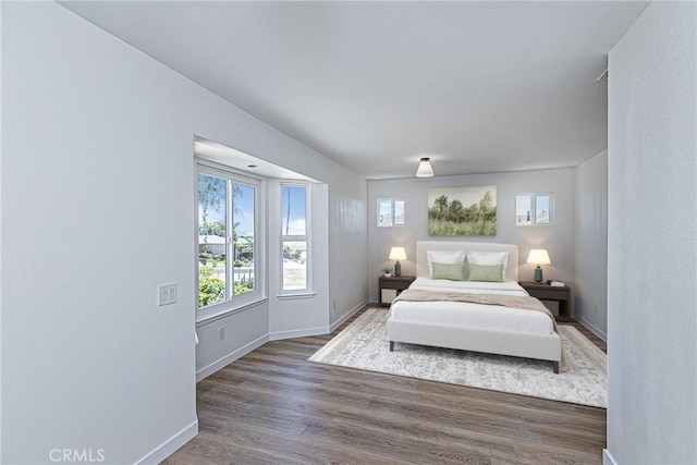 654 Carina Dr, Lompoc, CA 93436 - bedroom with baseboards and wood finished floors
