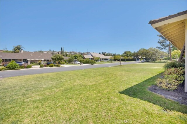 18132 James Rd, Villa Park, CA 92861 - view of grassy yard featuring a residential view