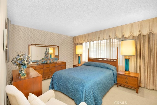 18132 James Rd, Villa Park, CA 92861 - bedroom with wallpapered walls, a textured ceiling, and light carpet