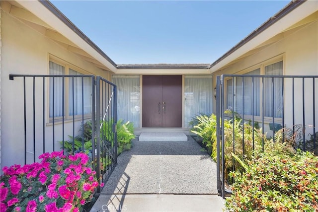 18132 James Rd, Villa Park, CA 92861 - doorway to property featuring stucco siding