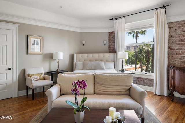 99 S Raymond Ave Unit 409, Pasadena, CA 91105 - bedroom with baseboards, wood finished floors, and brick wall